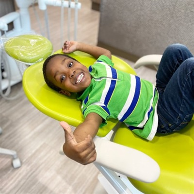 Child brushing big teeth